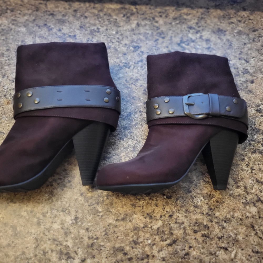 Unlisted brown heeled boots in size 9.5